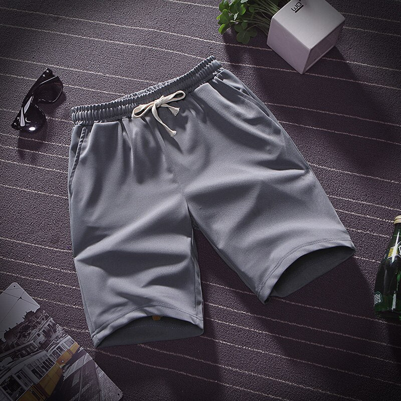 Summer thin ice silk five minute pants men wear loose sports casual shorts pyjama pants beach pants home big pants